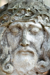 Antique statue  of  Jesus Christ crown of thorns. Religion, faith, death, resurrection concept