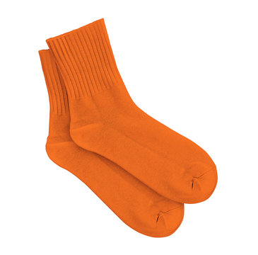 Orange socks on an isolated white background.