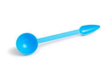 Blue measuring spoon on isolated white background