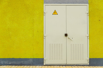 Iron gray door of a transformer box.