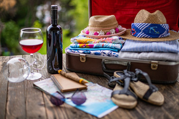 Suitcase preparation for a summer holiday , Retro , vintage and old luggage   