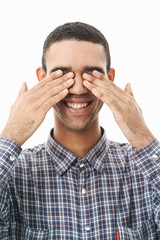 Close up of a happy young man wearing plaid t-shirt