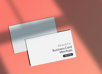 Realistic business card layout mockup template for branding and identity with shadow effects.