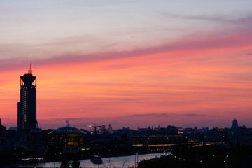 Pink sunset in a major city. Moscow