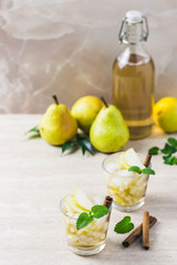 Ginger pear kombucha mocktail. Selective focus, space for text.