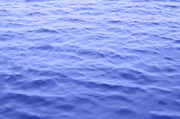 Abstract background closeup sea of blue color.