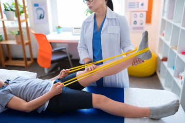Hard-working little patient going through rehabilitation process