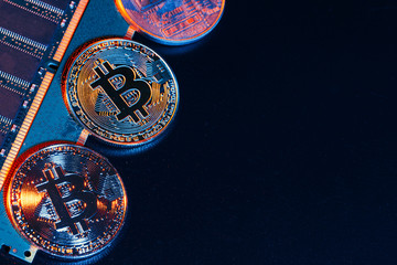 golden bitcoin and computer chip in background