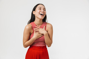 Beautiful young pretty asian happy woman posing isolated over white wall background.