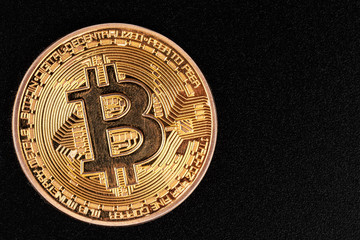 Golden Bitcoins On Black Background. Trading Concept Of Crypto Currency