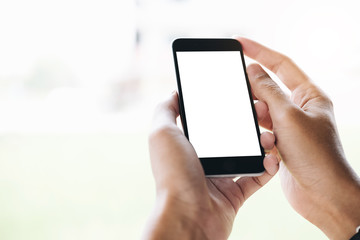 woman using Smartphone. Blank screen mobile phone for graphic display montage.networking service.	