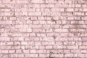 Unusual bright saturated abstract pink background from old brick wall in retro style