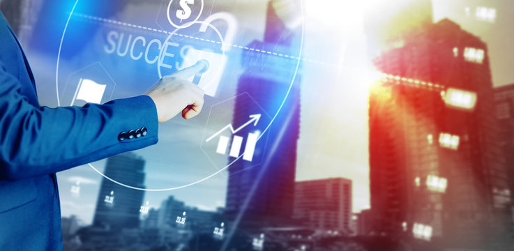 Business man point to success text hologram future concept.