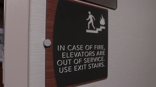 In case of emergency, use stairs sign