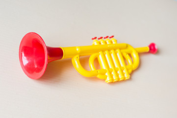 Children trumpet made of colored plastic © Kiryakova Anna
