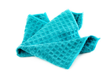 Clean blue kitchen towel on white background.