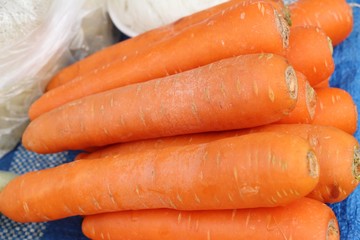 Fresh organic carrots for cooking in market