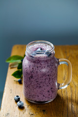 Obraz na płótnie Canvas Blueberry smoothie in the jar