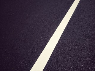 Road traffic paint White on the asphalt surface