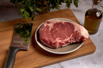 red veal chop on a plate