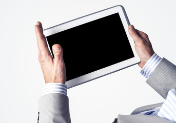 Hands of businessman holding tablet pc with black screen