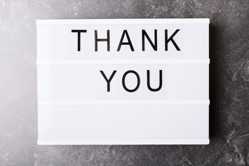 Wort Thank you  auf Lichtbox