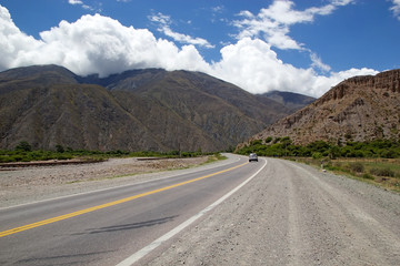 Car along the road in the Quebrada de Humahuaca, Argentina