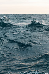ripples on blue sea water , natural sea background