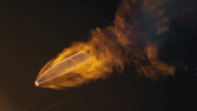 Slow motion shot of shooted bullet with fiery trail. Fire ammunition in slomo.