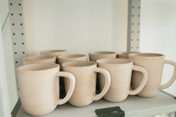 Ceramic mug made on a Potter's wheel in the workshop