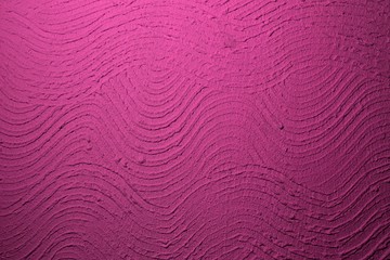 pink grunge waved stucco on wall texture - fantastic abstract photo background