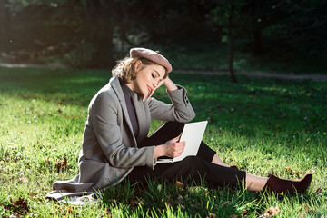 Work outdoors benefits. Education technology and internet concept. Girl work with laptop in park sitting on grass. Natural environment office.