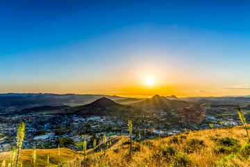 Evening Light on Mountains and City