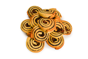 Baked cookies with raisins and poppy seeds isolated on white background.
