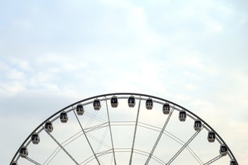 A circle swing with sky and blank for copy space.