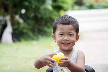 close up portrait of  a child boy smiling.