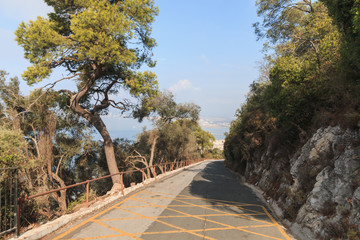 Road downhill on the edge of The Rock cliff, Gibraltar