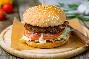 Burger with meat on board