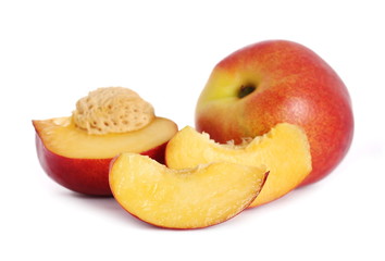 Fototapeta na wymiar Fresh ripe peach fruit slice isolated on white background