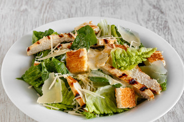 Caesar salad with chicken and cheese
