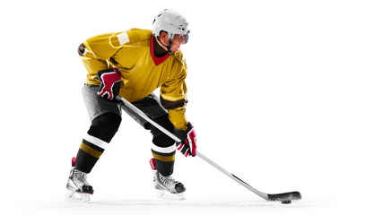 Professional ice hockey player in action on white backgound