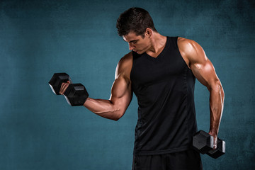 Handsome Athletic Men Exercise With Weights