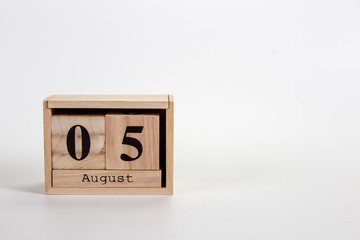 Wooden calendar August 05 on a white background