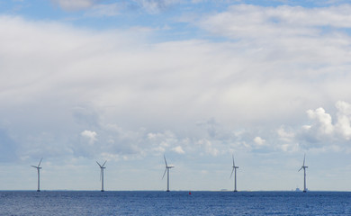 Offshore wind turbines on the coast of Copenhagen in Denmark 