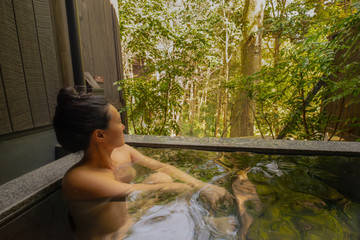 Beautiful Asian Woman bathes Nude in Onsen