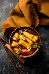 Baby Corn Manchurian with gravy - popular Indo-chinese recipe. selective focus