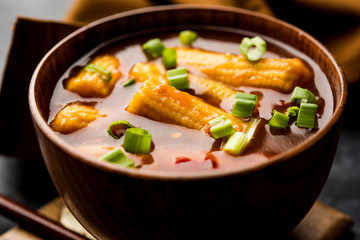 Baby Corn Manchurian with gravy - popular Indo-chinese recipe. selective focus