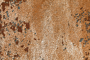 Rusty yellow-red textured metal surface. The texture of the metal sheet is prone to oxidation and corrosion. Textured background in grunge style