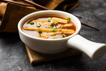 Baby Corn Manchurian with gravy - popular Indo-chinese recipe. selective focus