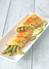 Coconut crepes with grilled asparagus